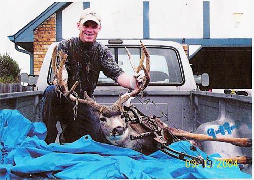 2004 Deer Steve Winchell
                    with his first bow kill. Sweet!!