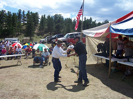 2005 Bowhunters Weekend Sonny Cross picks up his
                    payday