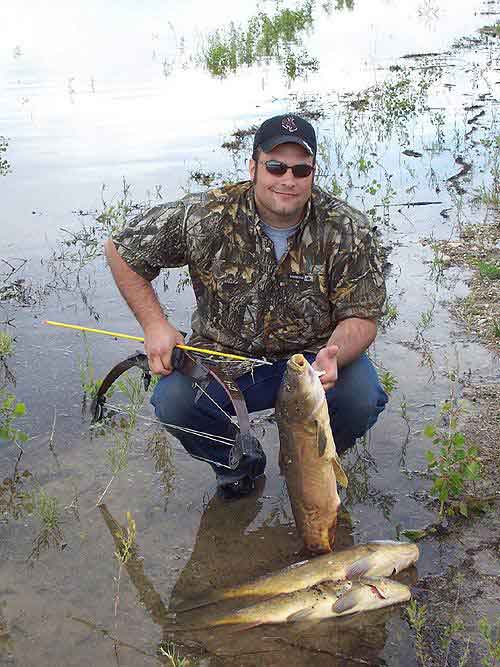 2005 Carp Shwacking Cody Mcrady with part of his
                    catch