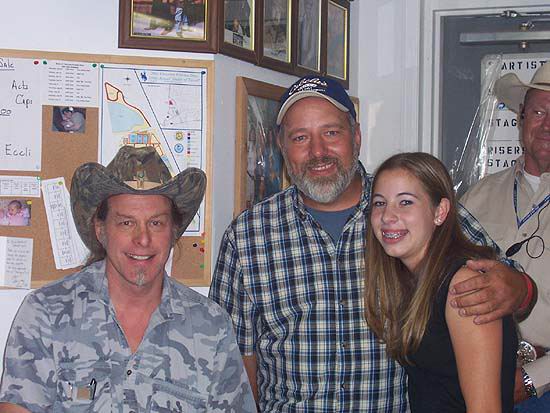 2005 Ted Nugent Neal and Amy Perkins get a photo
                    with Nugent