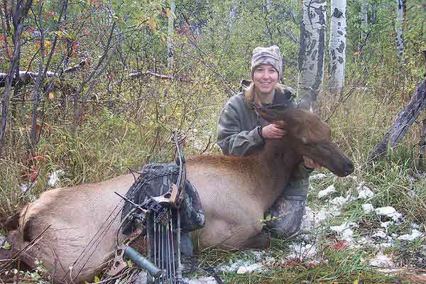 2006 Elk Neal's hunting
                    partner, Stephanie Perkin's first elk using a bow.