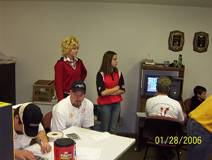 2006 Triple Crown Adam &
                    Rick checking score cards