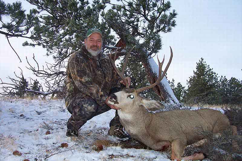 2007 Deer Neal Perkins with
                    this year mule deer
