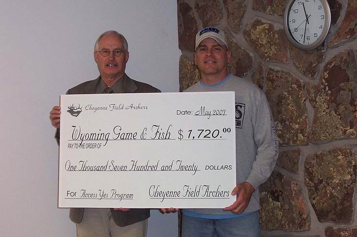 2007 Access Yes Dan Conrad presenting CFA's
                    Access Yes donation to Game & Fish